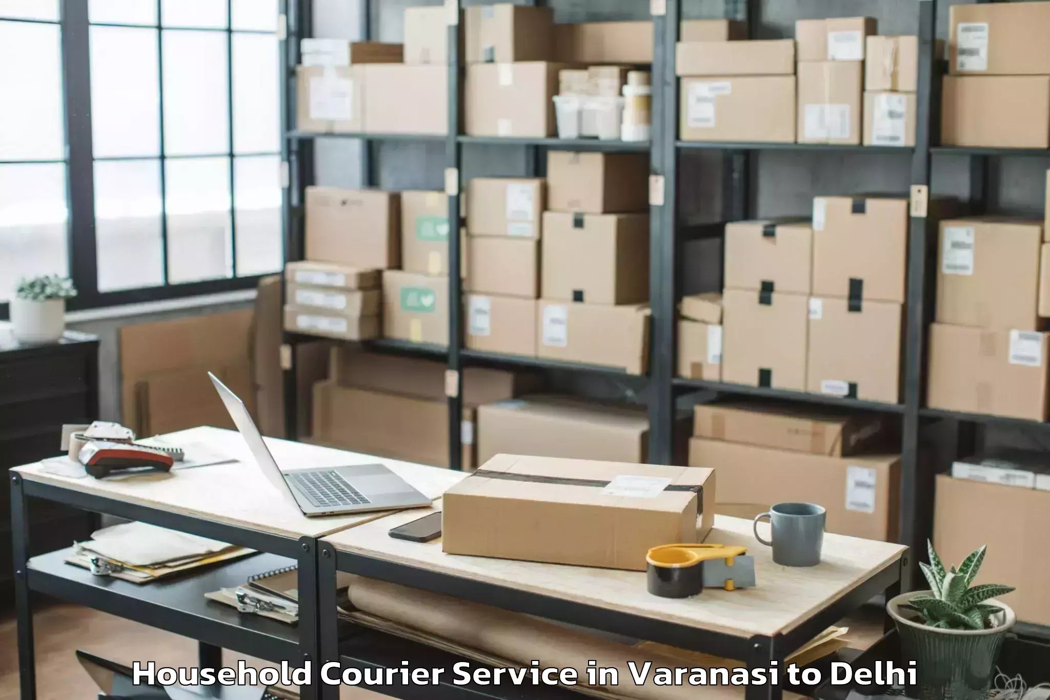 Get Varanasi to Ambience Mall Rohini Household Courier